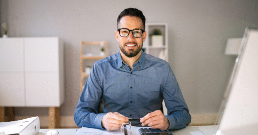 a man sitting a desk looking over home equity options