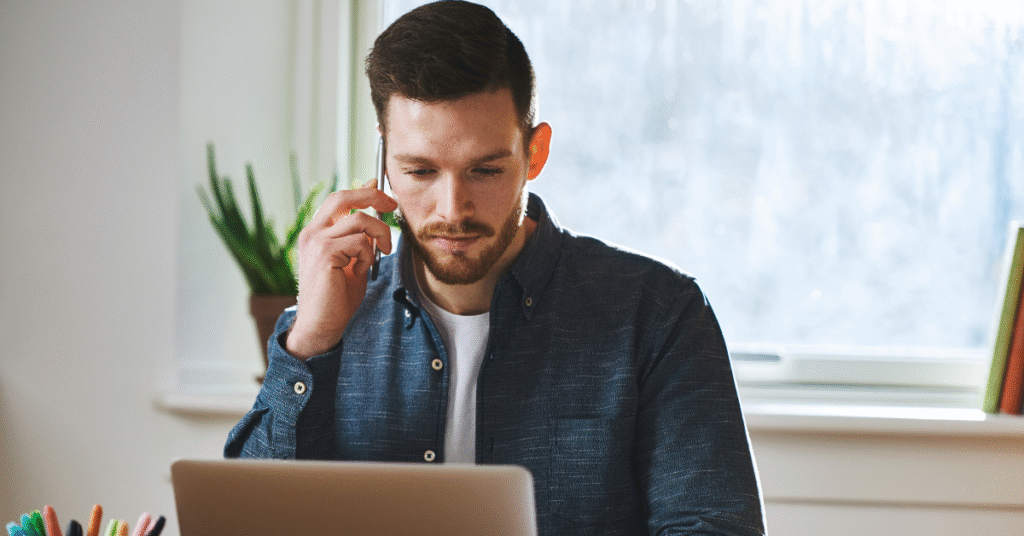 A man using Second mortgage calculator