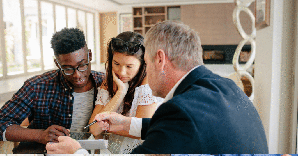 What Fees Should I Expect When Taking Out a Home Equity Loan in Ontario 7 Ontario homeowners discussing home equity loan fees with a mortgage advisor.