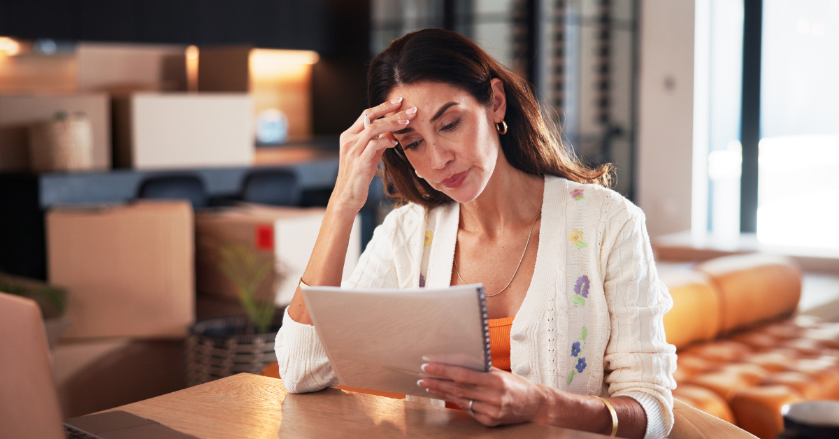 A woman worried about her missed mortgage payments