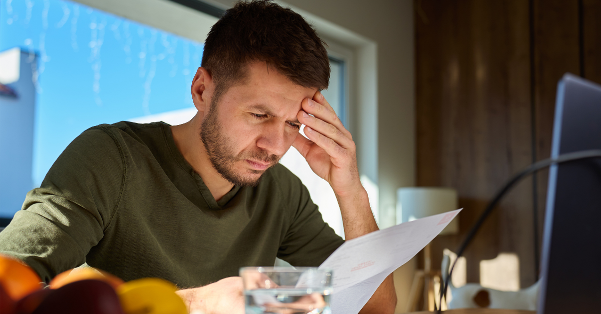 homeowner reading Fixed vs Variable Mortgage Rates
